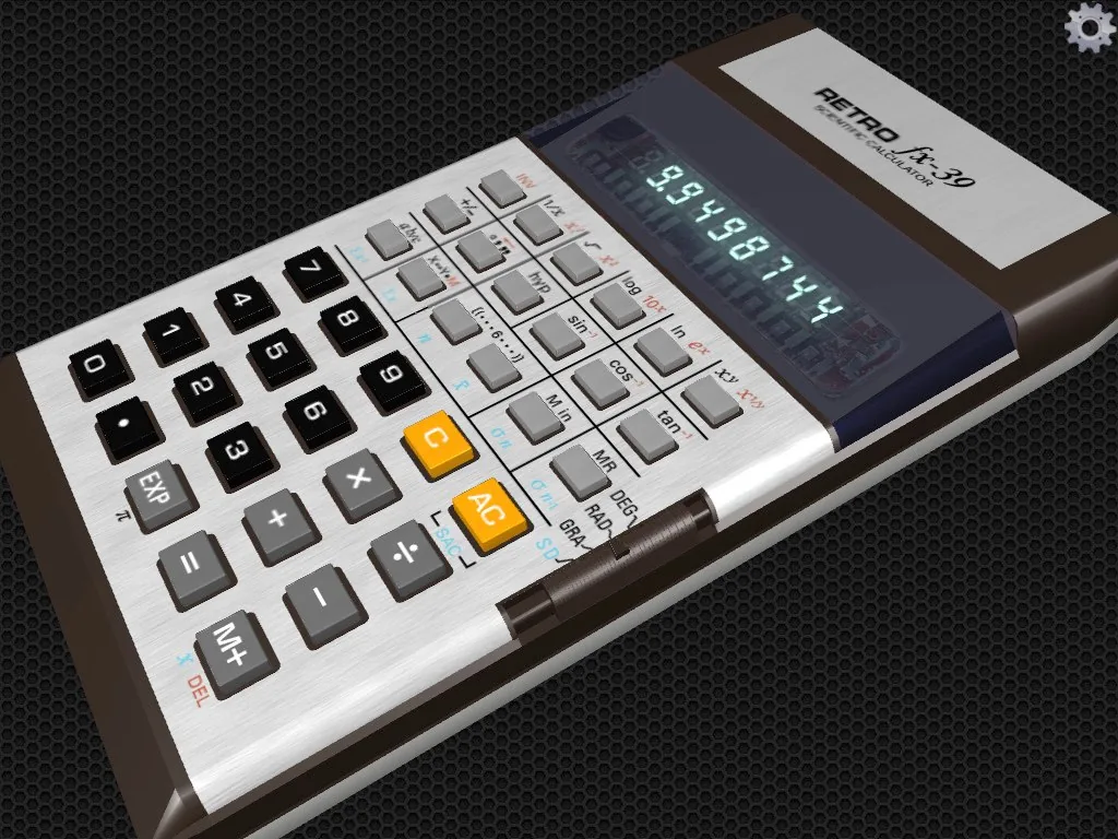 The calculator turned onto its side, seen at an angle, mid-calculation.